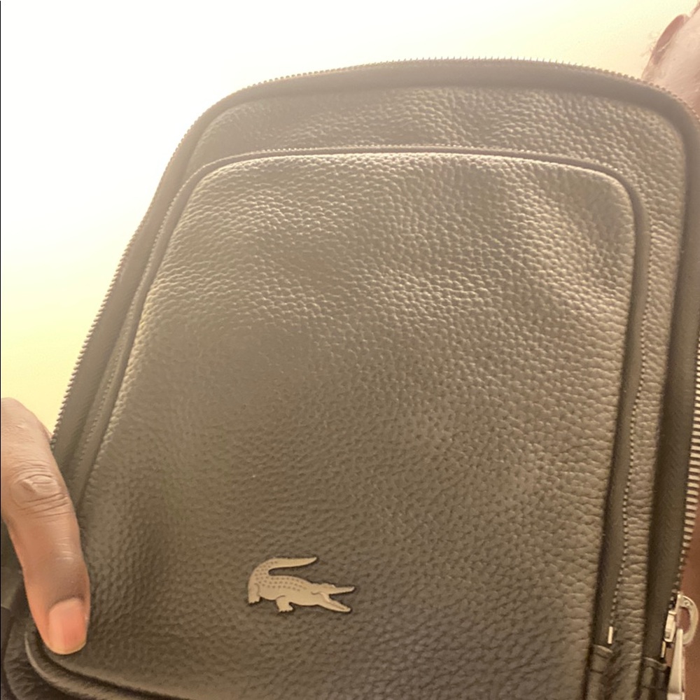 Lacoste Black Backpack with Iconic Crocodile Logo and Grained Texture